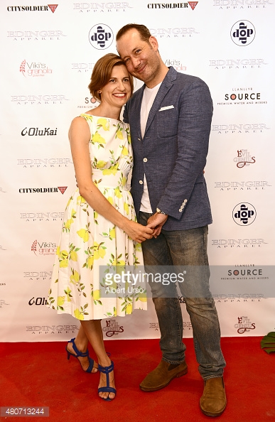 Designers Erik Nelson and Emily Cummings pose on the red carpet at the Edinger Apparel presentation during New York Fashion Week Men's SS16 at Rogue Space on July 14, 2015 in New York City