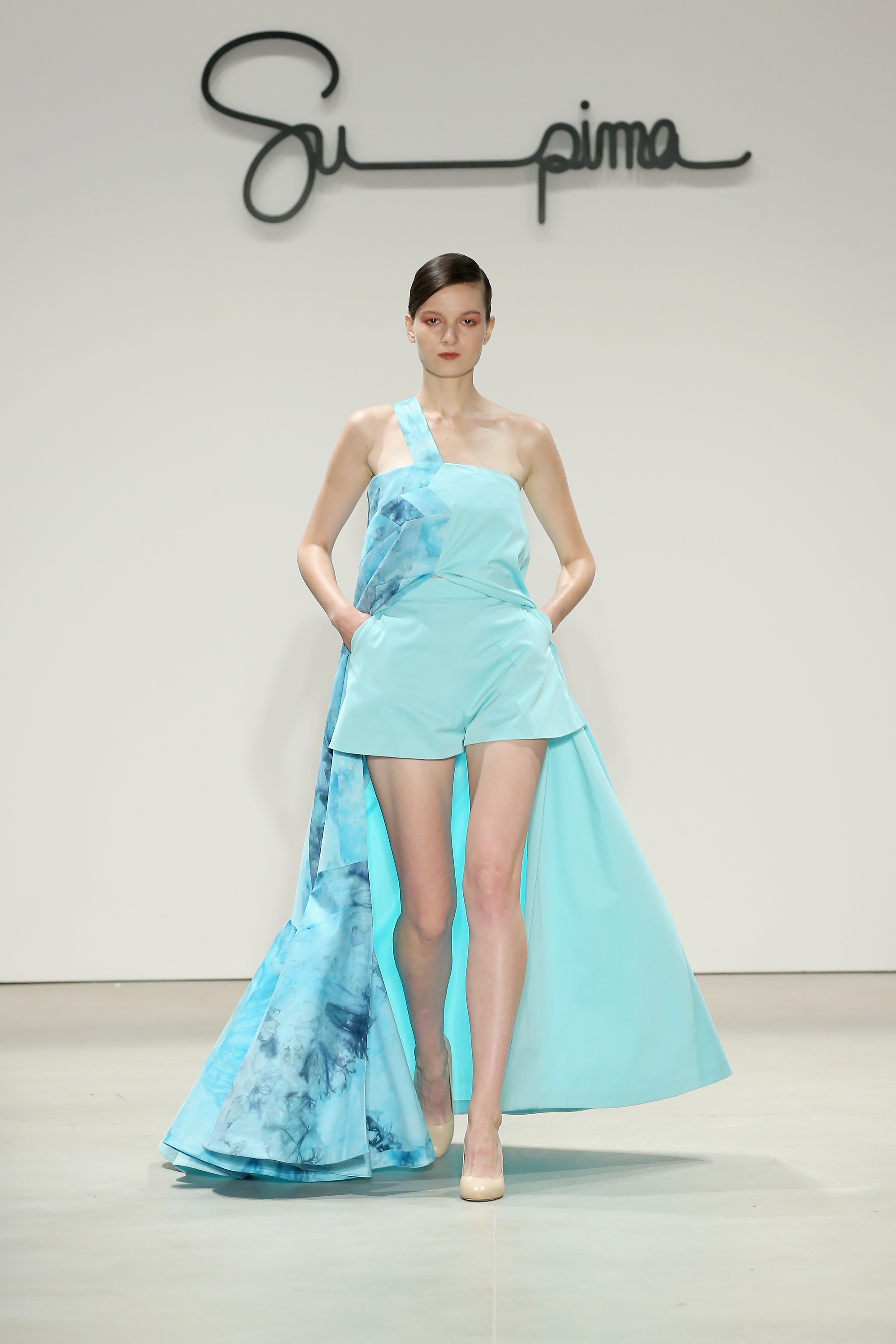 Twill floor length, tent shaped dress, ice dyed in hues of blue with single shoulder strap, Courtesy of Supima