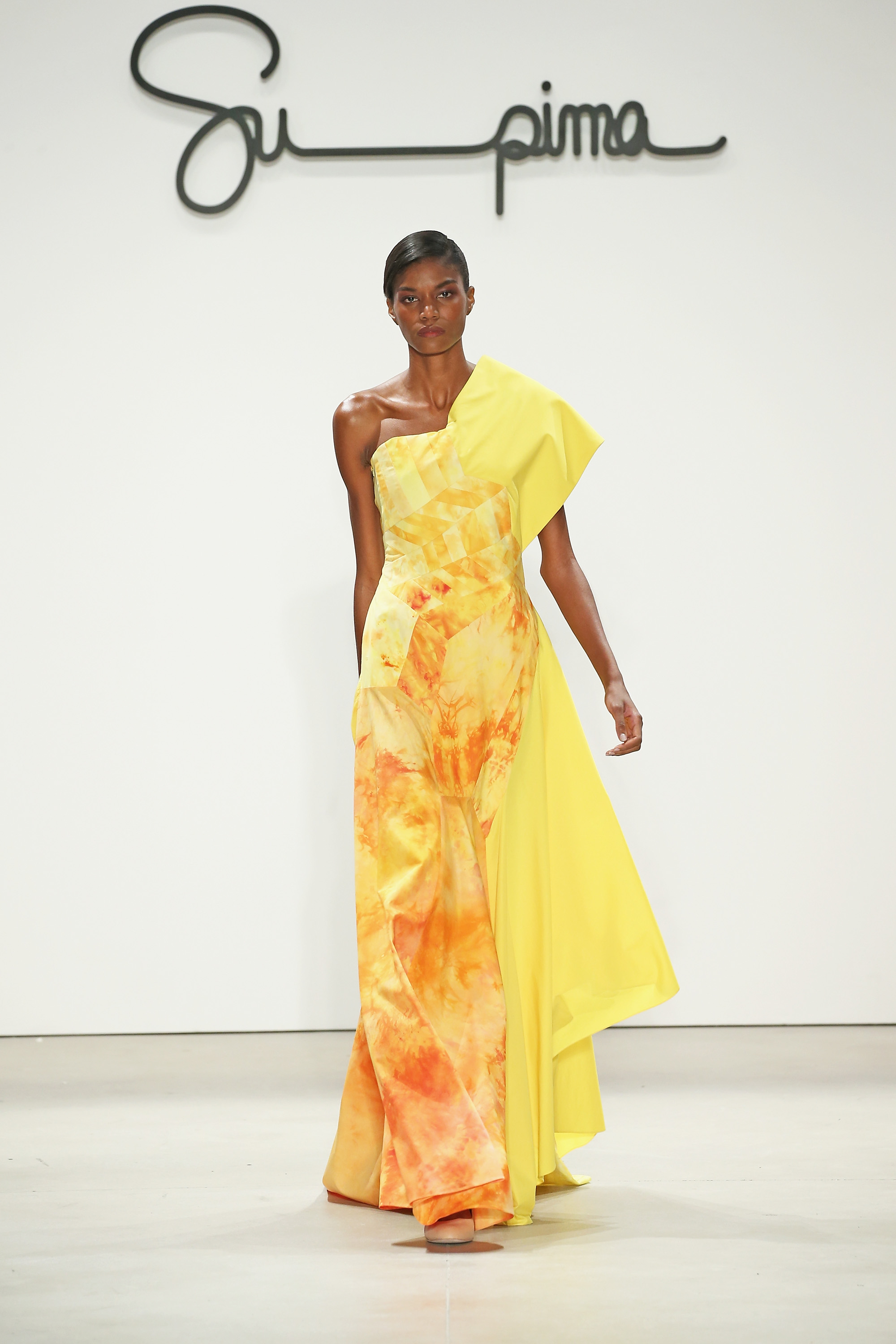Shirting dress, ice dyed in fiery oranges and yellow with asymmetrical hemline, Courtesy of Supima