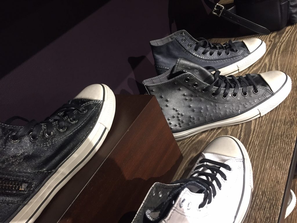 A display of John Varvatos' newest design collaboration with footwear brand Converse. Image Source: Fashion School Daily