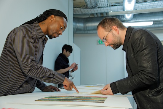 William West (left) talks to Andrew Buckler at the Spring Portfolio Review. (Photo credit: Randy Brooke)