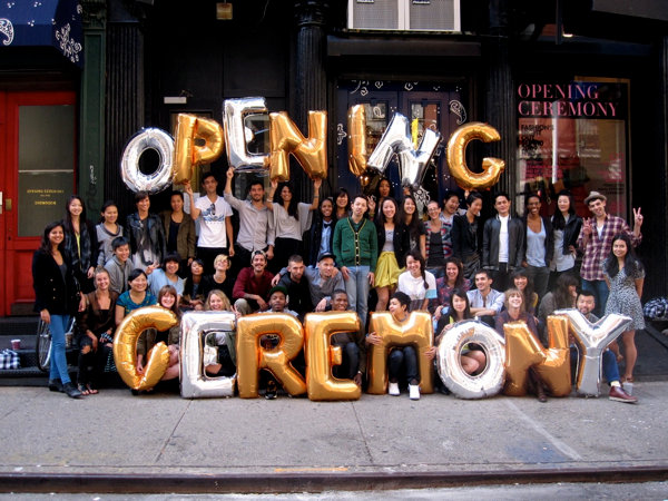 Picture of Opening Ceremony standing in front of storefront