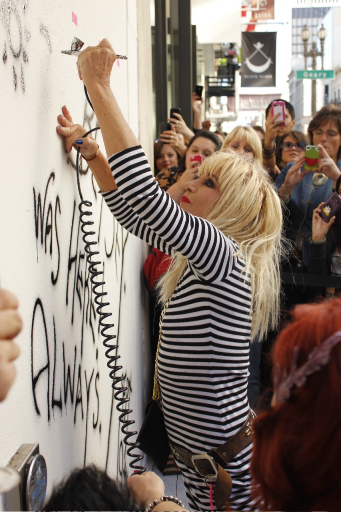 Betsey working on her mural