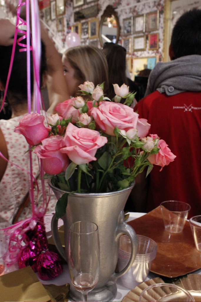 A table of Champagne and Pink Roses