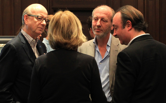 Gladys Perint Palmer chats with the Honorable Thomas E. Horn, Denis Bisson, and Director of Graduate Fashion Sean Moore