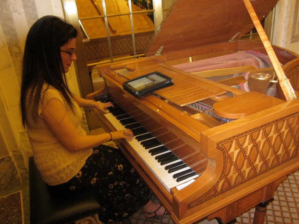 The pianist at The Plaza plays music from her Kindle