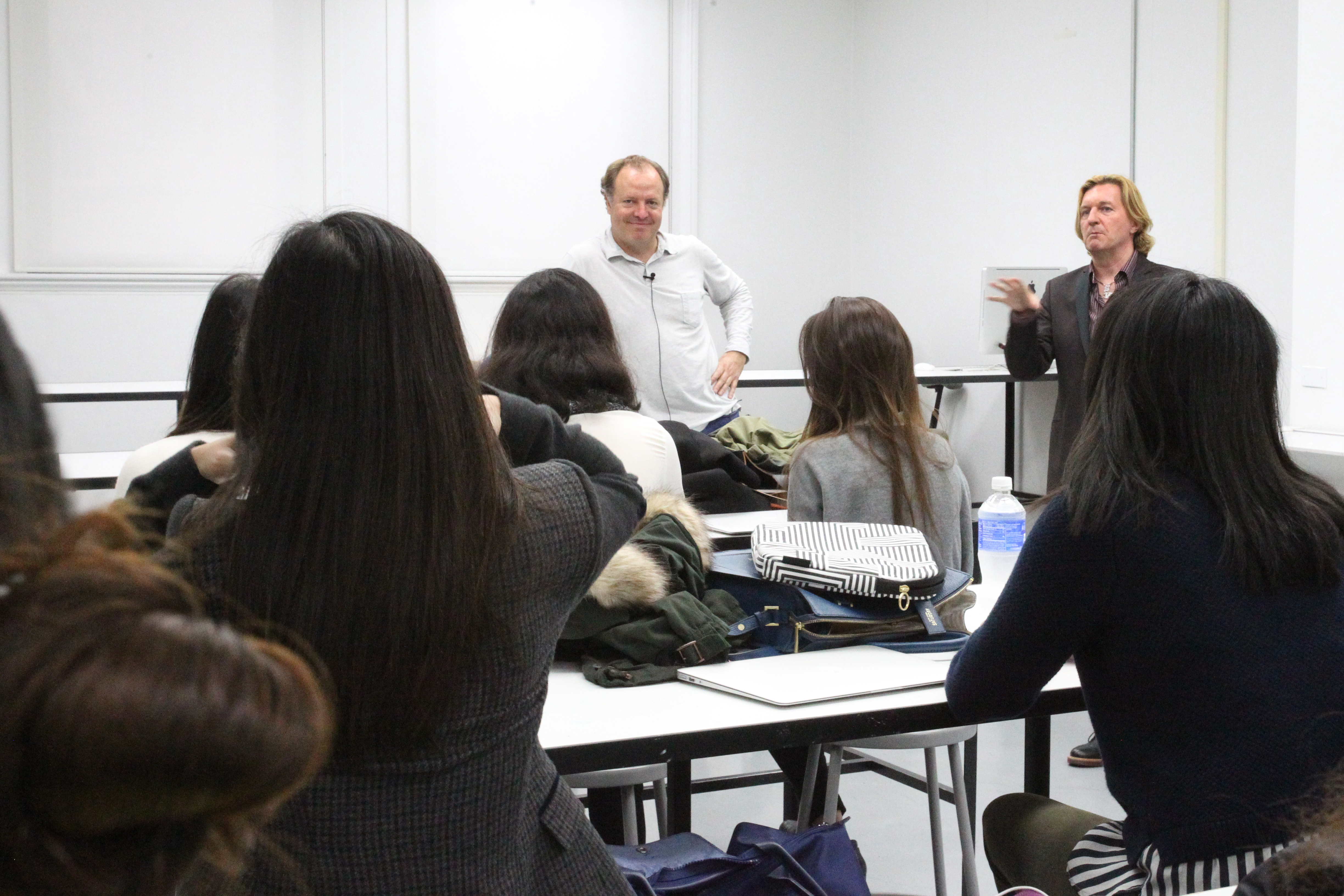 Massimo Redaelli and Keanan Duffty speak to the class; photo by Bob Toy