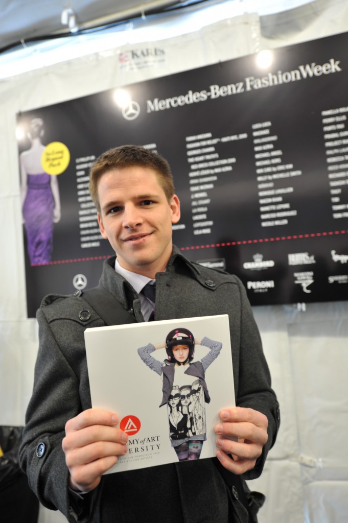 Danny Roberts with a copy of 180 Magazine Volume 3, the cover of which was graced by Roberts’ collaboration with Forever2